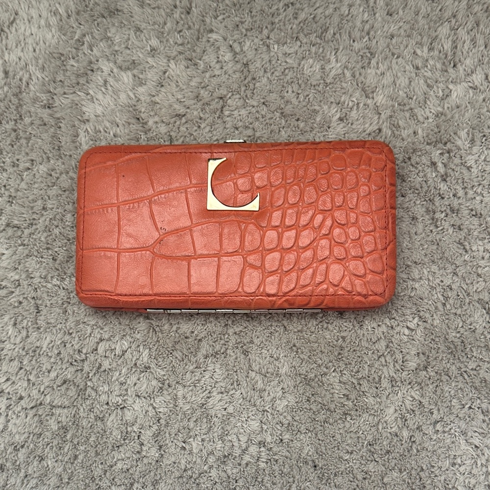 Elegant Crocodile-Embossed Orange Clutch